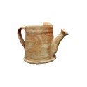 Terracotta watering can